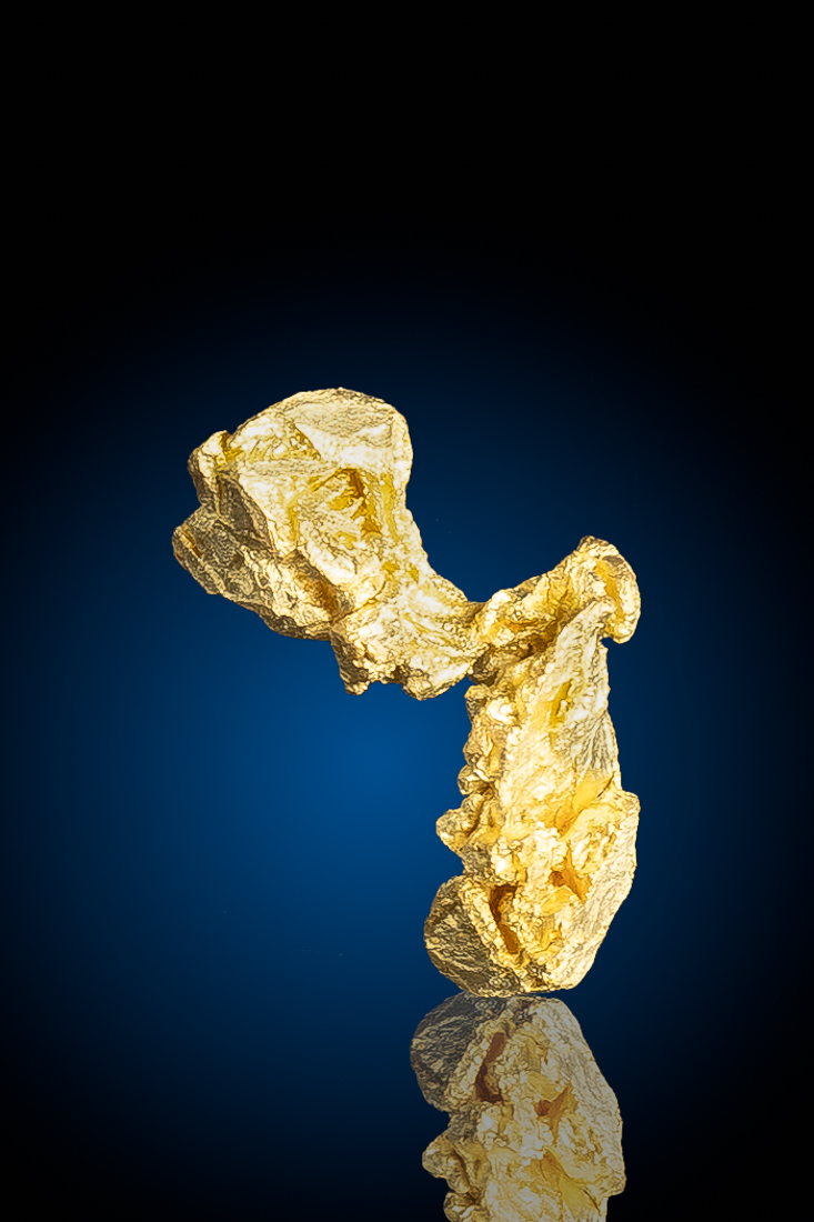 (image for) Hoppered "Boomerang" sharp gold crystal from Ten Mile, Nevada